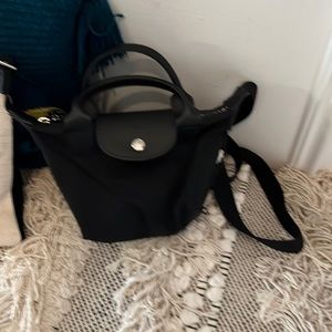 Authentic Longchamp pilage mini crossbody bag in black nylon. Amazing condition